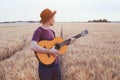 Young man playing guitar, romantic music love song