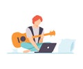 Young Man Playing Guitar, Guy Learning Guitar Through Internet Course Using Laptop Comuter, Online Education, Hobby