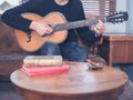 Young man playing guitar at home Royalty Free Stock Photo