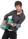 Young man playing guitar Royalty Free Stock Photo