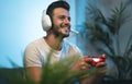 Young man playing online video games at home Royalty Free Stock Photo