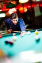 Young man playing pool Royalty Free Stock Photo