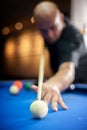 Young man playing pool game in pub Royalty Free Stock Photo