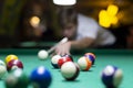 Young man playing pool in pub Royalty Free Stock Photo