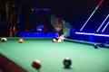 Young man playing pool in pub Royalty Free Stock Photo