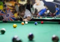 Young man playing pool in pub Royalty Free Stock Photo