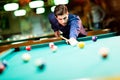 Young man playing pool Royalty Free Stock Photo