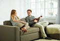 Young man playing ukulele to his girlfriend Royalty Free Stock Photo