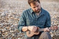 Young man playing ukulele Royalty Free Stock Photo