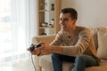 Young man playing video game at home Royalty Free Stock Photo