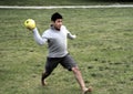 Young man playing a volleyball game outside Royalty Free Stock Photo