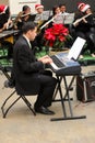 Young man plays music keyboard