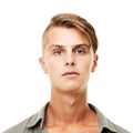 Young man, portrait and face with hairstyle, serious or blank stare isolated against a white studio background Royalty Free Stock Photo