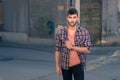 Young man portrait, graffiti village, old city Royalty Free Stock Photo