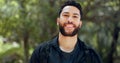 Young man portrait, nature hiking and freedom, travel and adventure in peace, calm and morning hike outdoors. Happy Royalty Free Stock Photo