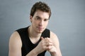 Young man portrait posing looking camera