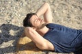 Young man portrait, relax on a sea beach Royalty Free Stock Photo