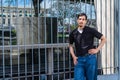 Young man posing in front of modern architecture Royalty Free Stock Photo