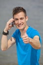 Young man posing thumbs up Royalty Free Stock Photo