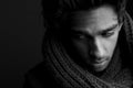 Young man posing with wool scarf Royalty Free Stock Photo