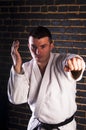 Young man practicing Brazilian jiu-jitsu (BJJ) Royalty Free Stock Photo