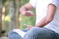Young man practicing traditional Tai Chi Chuan, Tai Ji  and Qi gong in the park for healthy, traditional chinese martial arts Royalty Free Stock Photo