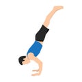 Young man practicing yoga handstand exercise