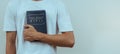 Young man prayer on bible, worship and religion. concept for faith, old Bible. copy space Royalty Free Stock Photo