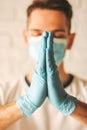 Religious man doctor praying for help Royalty Free Stock Photo