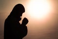 Young man praying with hand, prayer concept for faith, spirituality and religion Royalty Free Stock Photo