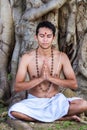 Young man prays Royalty Free Stock Photo