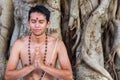 Young man prays Royalty Free Stock Photo