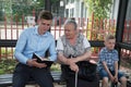 Young man preaching to an old woman Royalty Free Stock Photo