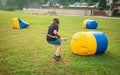 Young man preparing for an attack during archery tag Royalty Free Stock Photo