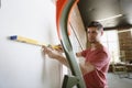 Young man doing apartment repair hisselfes Royalty Free Stock Photo