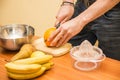 Young man preparing a fruit salad or smoothie Royalty Free Stock Photo
