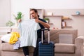 Young man preparing for journey at home Royalty Free Stock Photo