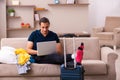 Young man preparing for journey at home Royalty Free Stock Photo