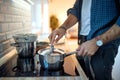 A young man preparing a meal in the kitchen. Kitchen, housework, quarantin, home Royalty Free Stock Photo