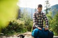 Young man preparing for a trek in the wilderness Royalty Free Stock Photo