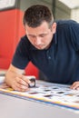 Close up of print color checking process with magnifying glass