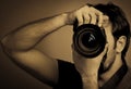 Young man with professional camera Royalty Free Stock Photo