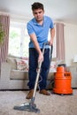 Young Man Professionally Cleaning Carpets Royalty Free Stock Photo