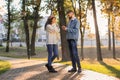 Young man proposing to his beloved in autumn park Royalty Free Stock Photo