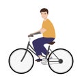 Young man with a prosthetic arm riding a bicycle. Handicapped person Royalty Free Stock Photo