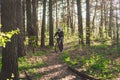 Young man in protective mask from environmental pollution riding mountain bike on cross country road. Cyclist Riding the Bike on Royalty Free Stock Photo