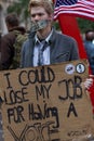 Young man with protest sign at Occupy Wall Street Royalty Free Stock Photo