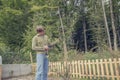 Young man pruning a tree in the garden Royalty Free Stock Photo