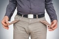 Man pulling out empty pockets - poor people concept Royalty Free Stock Photo