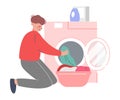 Young Man Putting Dirty Clothes in Washing Machine, Guy Doing Laundry at Home Flat Style Vector Illustration Royalty Free Stock Photo
